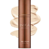 A bronze bottle labeled INIKA Organic Organic BB Cream 30ml stands before beige cream swirls on a white background, showcasing this product’s natural satin finish. The word "Cream" appears below the image.