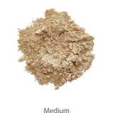 A pile of loose, medium beige INIKA Organic Foundation Trial Sets - 4 Piece Set is displayed on a white background with "Medium" below, ideal for those seeking a natural-finish foundation.