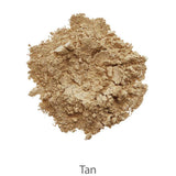 A heap of loose, tan-colored powder with a crumbly texture is shown on a white background, labeled "Tan." It appears to be from the INIKA Organic Foundation Trial Sets - 4 Piece Set.