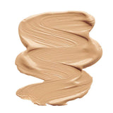 A smooth, thick swatch of light beige INIKA Organic Liquid Foundation 30ml in shade Honey displayed on a white background.
