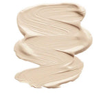 A smooth, creamy, light beige smear of INIKA Organic Liquid Foundation 30ml with visible brush strokes and labeled Nude at the bottom.