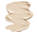 A smooth, creamy, light beige smear of INIKA Organic Liquid Foundation 30ml with visible brush strokes and labeled Nude at the bottom.