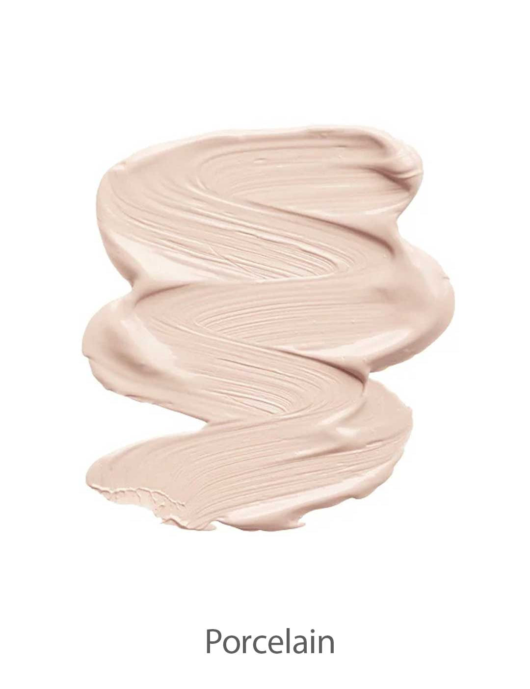 A smooth, creamy swatch of light beige INIKA Organic Liquid Foundation 30ml with a dewy finish and subtle pink undertone, labeled Porcelain below.