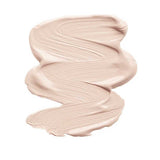 A smooth, creamy swatch of light beige INIKA Organic Liquid Foundation 30ml with a dewy finish and subtle pink undertone, labeled Porcelain below.