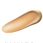 A swatch of Luk Beautifood Instant Glow Skin Tint 30ml in Nude 3: Light/Medium, a cream makeup with a light to medium nude shade, is shown on a white background. This tinted moisturiser delivers an instant radiant glow and natural luminous finish.