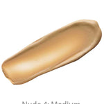 A swatch of Luk Beautifood Instant Glow Skin Tint 30ml in Nude 4: Medium, a medium beige tinted moisturiser with light coverage, is displayed on a plain white background.
