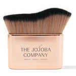 The Jojoba Company rose gold application brush for Illuminating Jojoba