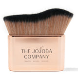 The Jojoba Company rose gold application brush for Illuminating Jojoba