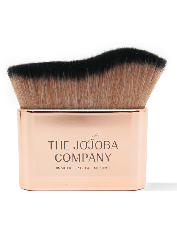 The Jojoba Company rose gold application brush for Illuminating Jojoba
