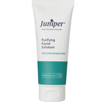 A white tube of Juniper Purifying Facial Exfoliant 100g, for oily and dehydrated skin, unclogs pores; features green accent bands near the bottom.