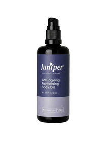 A black pump bottle labeled Juniper Anti Ageing Revitalising Body Oil 100ml, a natural body oil for all skin types and mature skin, Practitioner Only, on a white background.