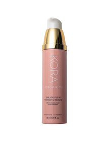 KORA Organics Kakadu Plum Vitamin C Serum 30ml features a pink bottle with a white and gold pump, designed to brighten skin and prevent uneven tone.