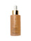 A 30 ml (1.01 fl. oz.) bottle of KORA Organics Noni Glow Face Oil with a gold and white dropper cap, labeled with the product name and description—a luxurious organic oil for glowing skin.