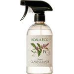 Koala Eco Glass Cleaner Peppermint 500ml is a clear spray bottle with a black nozzle. The label shows peppermint leaves and flowers, highlighting its streak-free formula made with Australian peppermint essential oil.