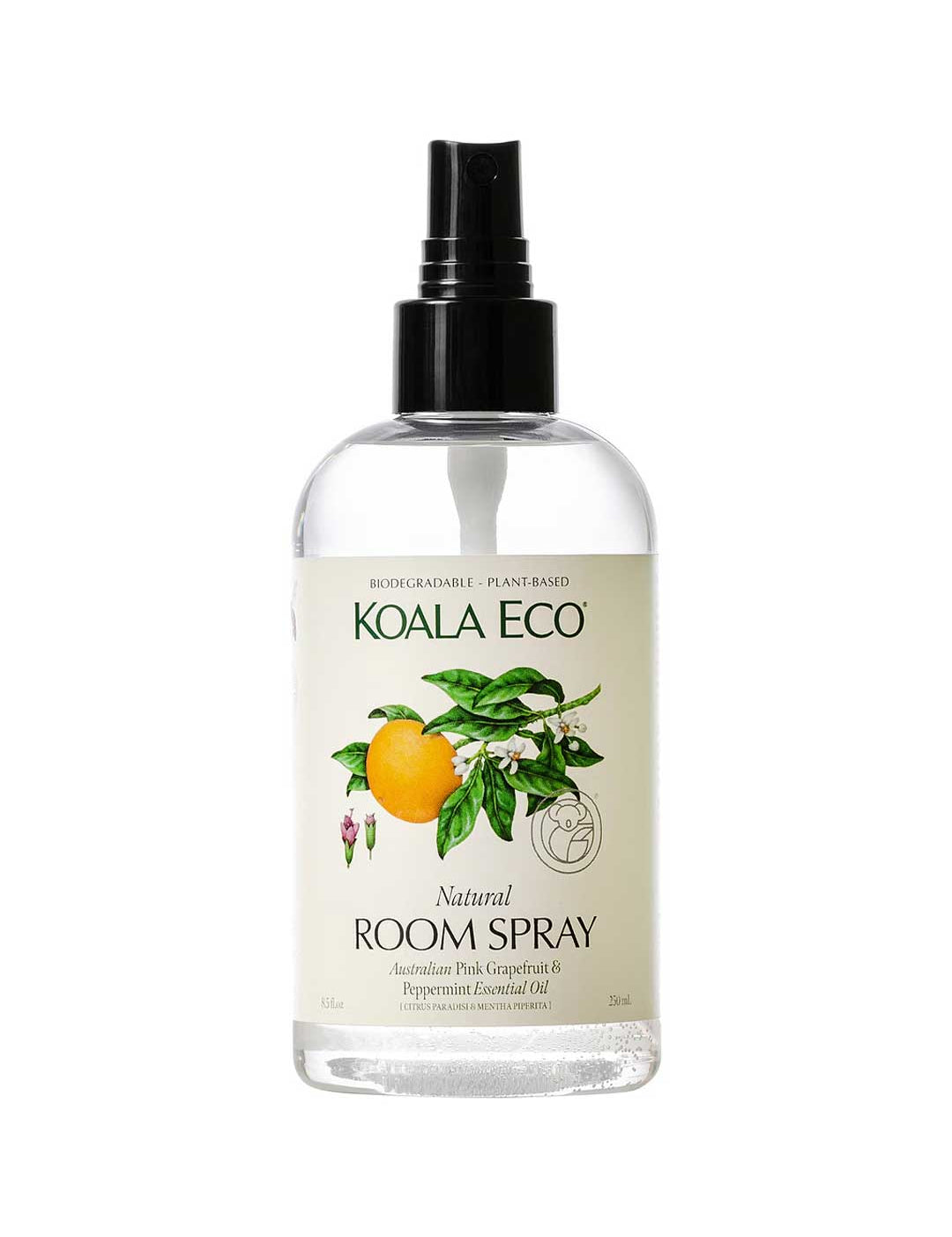 Koala Eco Room Spray Pink Grapefruit & Peppermint 250ml comes in a clear bottle with a black nozzle and an illustrated label. This plant-based, biodegradable spray refreshes any space with natural scents.