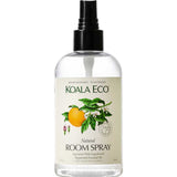 Koala Eco Room Spray Pink Grapefruit & Peppermint 250ml comes in a clear bottle with a black nozzle and an illustrated label. This plant-based, biodegradable spray refreshes any space with natural scents.