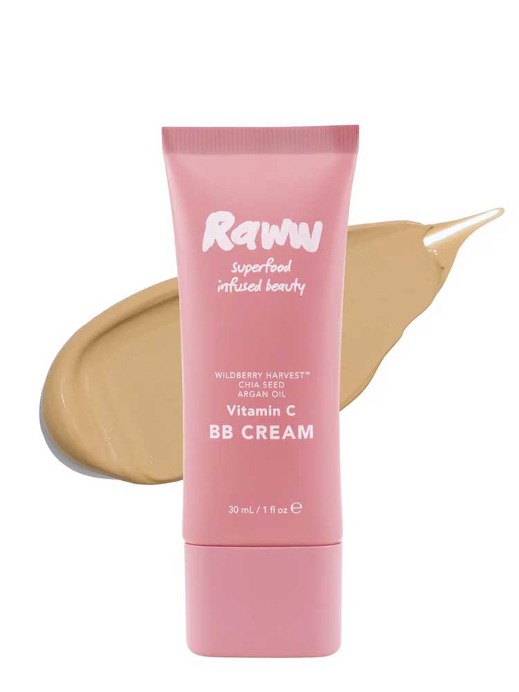 A pink tube labeled RAWW Vitamin C BB Cream 30ml is shown before a beige swatch. Enriched with wildberry harvest, chia seed, and argan oil, this hydrating balm helps reveal a luminous complexion.