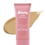 A pink tube labeled RAWW Vitamin C BB Cream 30ml is shown before a beige swatch. Enriched with wildberry harvest, chia seed, and argan oil, this hydrating balm helps reveal a luminous complexion.