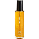 A clear bottle of LAMAV Ayurvedic Body Oil Nourish 120ml with a black cap, containing golden organic oil. The label reads LAMAV Ayurvedic Body Oil NOURISH and shows a volume of 120ml (4.06 fl oz).