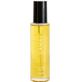 A clear bottle of LAMAV AYURVEDIC Body Oil Unwind 120ml with a black cap and yellow oil inside is shown on a white background—ideal as a relaxing self-care oil.