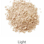 A pile of finely ground light beige LAMAV Anti Ageing Mineral Foundation SPF 15 is spread out on a white background. The word Light appears below the powder.