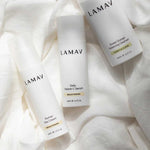 The LAMAV Brightening Skin Discovery Pack (3 Pack) is displayed on soft fabric, highlighting LAMAV’s organic brightening skincare for radiant skin and effective pigmentation treatment.