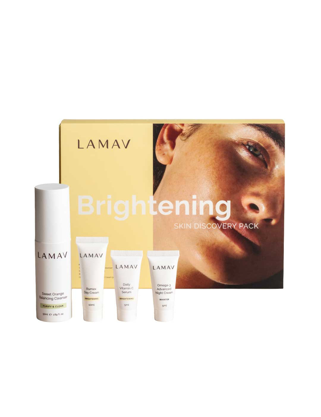 LAMAV Brightening Skin Discovery Pack (4 Pack) includes four organic skincare products and comes in a box featuring a woman’s face and the pack name—ideal for your brightening skincare routine.