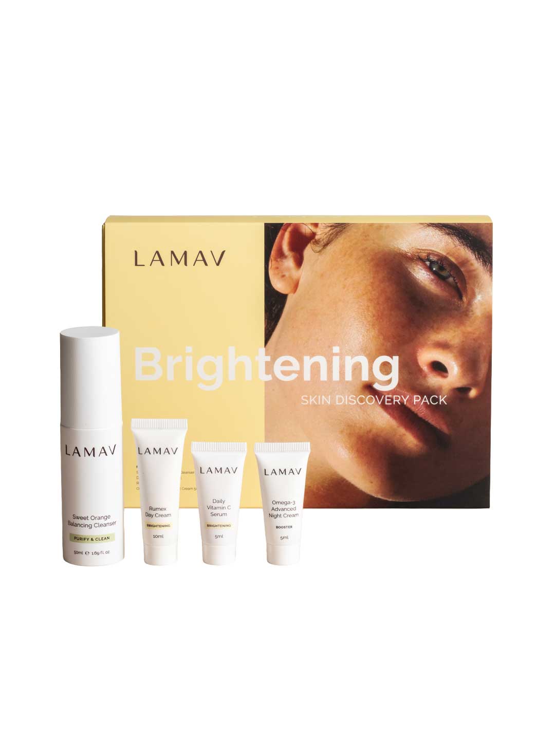 LAMAV Brightening Skin Discovery Pack (4 Pack) includes four organic skincare products and comes in a box featuring a woman’s face and the pack name—ideal for your brightening skincare routine.