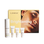 LAMAV Brightening Skin Discovery Pack (4 Pack) includes four organic skincare products and comes in a box featuring a woman’s face and the pack name—ideal for your brightening skincare routine.