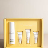 The LAMAV Brightening Skin Discovery Pack (4 Pack) includes Sweet Orange Balancing Cleanser, Daily Vitamin C Serum, Omega-3 Advanced Night Cream, and Bio-Active Day Cream for radiant skin.