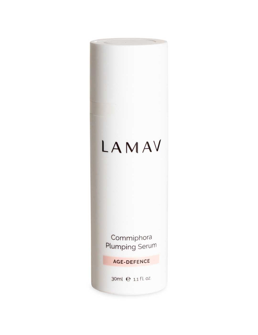 A white cylindrical bottle labeled LAMAV Commiphora Plumping Serum 30ml stands against a white background—an anti-ageing serum formulated to boost collagen and improve skin elasticity.