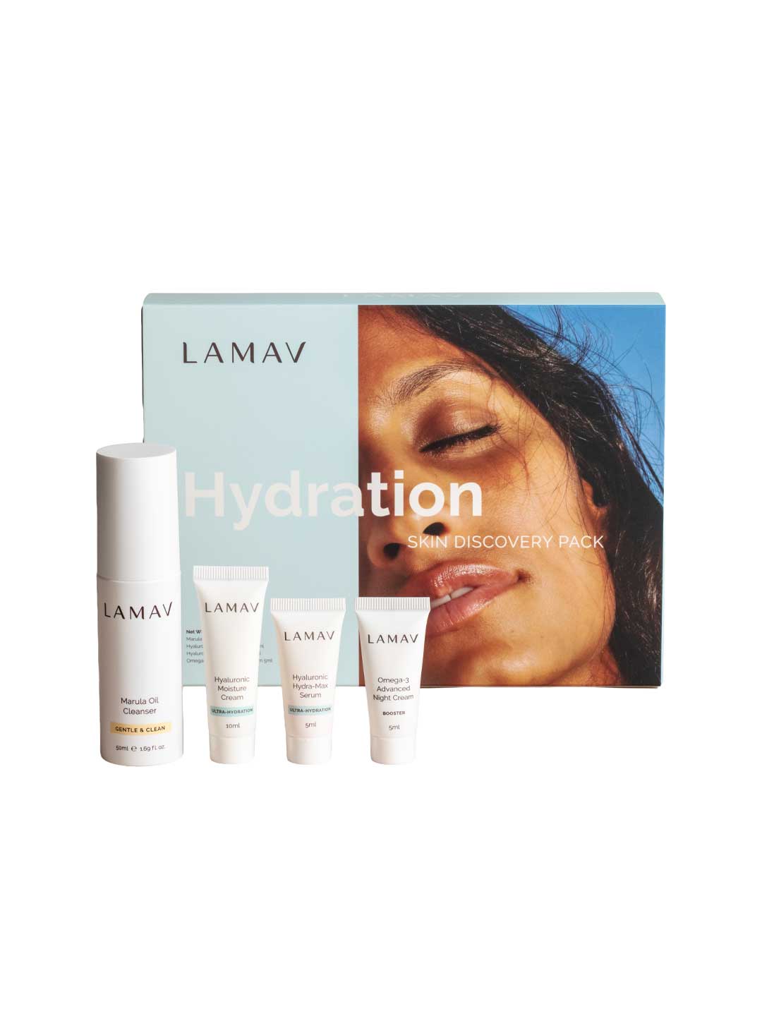 The LAMAV Hydration Skin Discovery Pack (4 Pack) features four hydration skincare products in sleek white tubes and bottles, displayed before a blue box with a woman's face—ideal for starting your organic skincare journey.