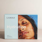 A box of LAMAV Hydration Skin Discovery Pack (4 Pack) displays a close-up of a peaceful woman's face against blue and beige, emphasizing LAMAV’s organic skincare and hyaluronic acid for deep hydration.