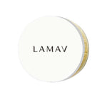 A round, white container labeled "LAMAV" in black and edged with gold holds LAMAV Mattifying Powder 3g. Perfect for talc-free loose powder, set against a plain white background.