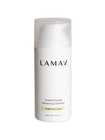 A 100ml white bottle of LAMAV Sweet Orange Balancing Cleanser features a translucent cap and Purify & Clean label, offering a natural face wash.