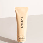 LAMAV Jojoba Exfoliating Scrub tube on a neutral background