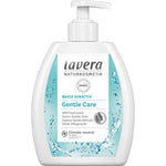 A white bottle of Lavera Basis Mild Hand Wash 250ml with a pump dispenser, blue accents, water splash graphics, and organic aloe vera for sensitive skin on the label.