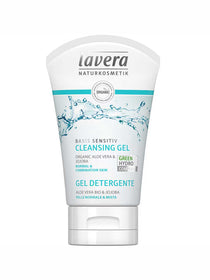 A white 125ml tube of Lavera Basis Sensitiv Cleansing Gel with blue accents, labeled for normal, sensitive, and combination skin. The front features water splashes and highlights organic aloe vera and jojoba ingredients.