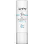 A white tube of Lavera Basis Sensitiv Lip Balm 4.5g with blue accents, featuring the Lavera Naturkosmetik logo, BIO organic label, and a blue water droplet—specially formulated for sensitive lips with organic jojoba oil.