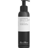 The Less is More Lavender Smooth Balm 150ml comes in a black and white pump bottle, offering certified organic haircare for leave-in frizzy hair control and added heat protection.