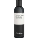 The Less is More Lindengloss Conditioner 200ml features a black and white minimalist bottle design with a black cap and label, offering organic care to repair, add shine, and protect colour-treated hair.