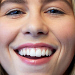 Model wearing Luk Beautifood Lip Nourish Lipstick in Nude Pink