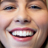 Model wearing Luk Beautifood Lip Nourish Lipstick in Nude Pink