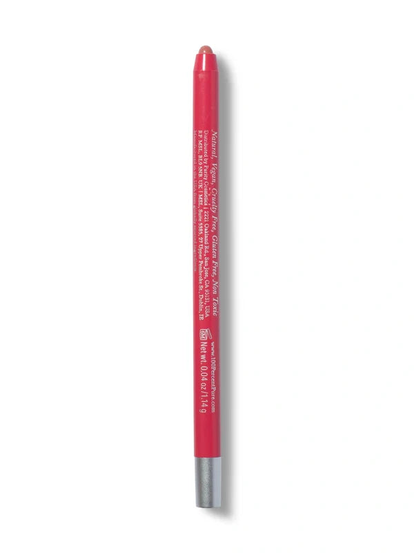 A coral-red 100% Pure lip liner stands upright with its rounded tip exposed. Small pale lettering covers the back of the barrel above a silver-coloured base.