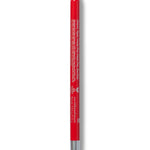 A bright red 100% Pure lip liner stands upright with its rounded red tip exposed. Small pale lettering runs down the back of the barrel, above a silver-coloured base.