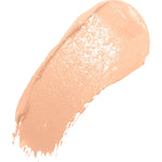A diagonal swatch of Crème Long Last Concealer in pale peach beige, with a creamy sheen and a thick rounded end tapering into fine streaks.