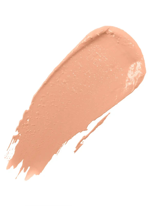 A diagonal swatch of Golden Peach Long Last Concealer in warm golden peach, with a creamy sheen and a rounded end tapering into fine streaks.