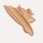 A smear of Ere Perez Lychee Crème Corrector 10ml in medium beige with high-pigment coverage on a light background, with the word Cuatro below it.