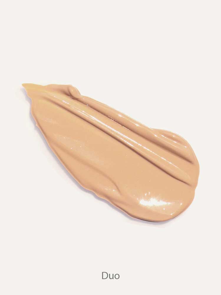 A smooth, creamy swatch of Ere Perez Lychee Crème Corrector 10ml in beige with high-pigment coverage against a light background, labeled "Duo" below the image.