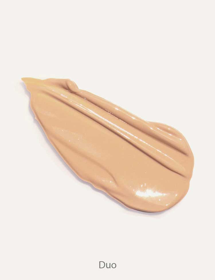 A smooth, creamy swatch of Ere Perez Lychee Crème Corrector 10ml in beige with high-pigment coverage against a light background, labeled "Duo" below the image.